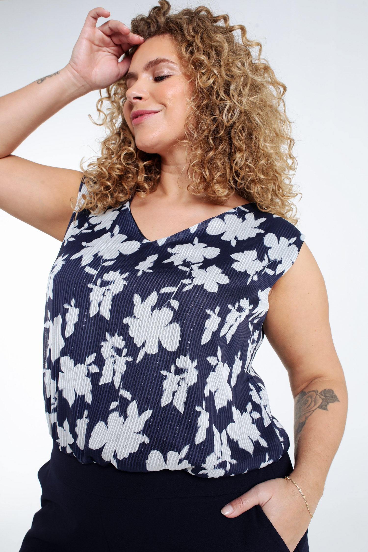 Tweedelige jumpsuit met bloemenprint en lurex